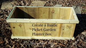 Create a rustic picket garden planter box